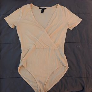Pale yellow bodysuit
